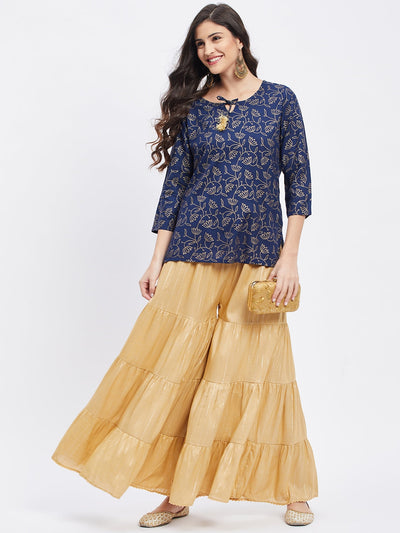 Fawn embellished Lurex flared gharara with elastic waistband.