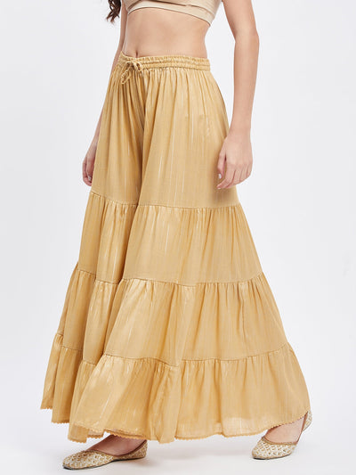 Fawn Embellished Lurex Flared Gharara with elastic waistband and drawstring.
