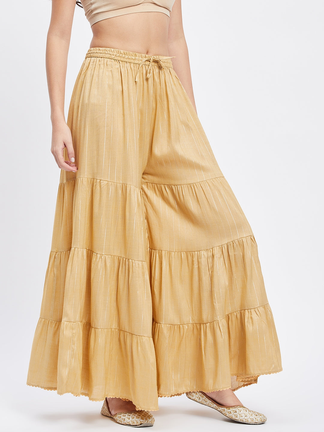 Fawn Embellished Lurex Flared Gharara with elastic waistband and drawstring.