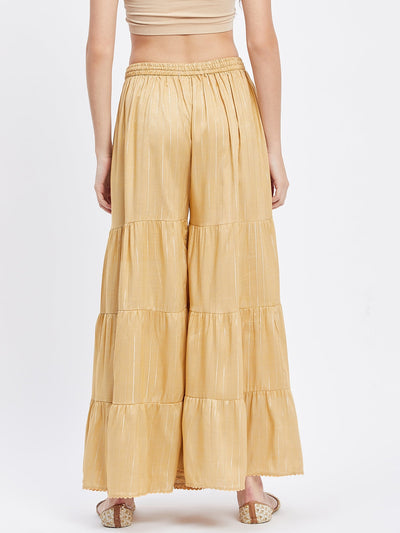 Fawn Embellished Lurex Flared Gharara with elasticated waistband and drawstring.