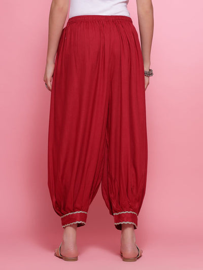 Maroon embellished hem design loose fit Afghani salwar with elastic waistband.