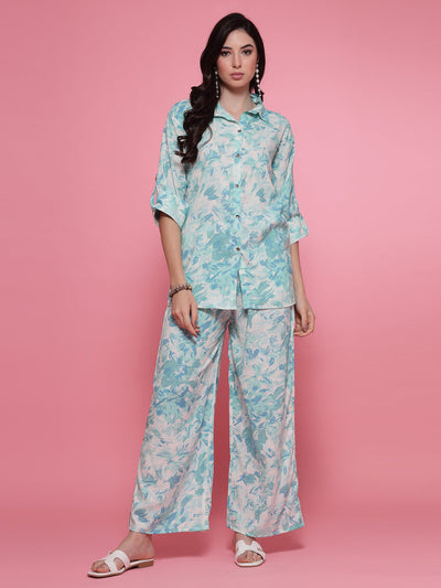 Sea green printed shirt with trousers co-ord set featuring floral print, three-quarter sleeves, and elasticated waistband.