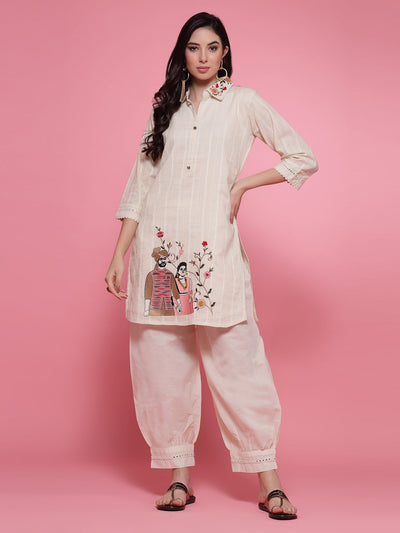 Off-White embroidered shirt and Afghani salwar co-ord set with detailed hem design.
