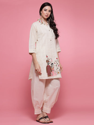 Off-white embroidered shirt and Afghani salwar co-ord set with detailed Kurti and three-quarter sleeves.