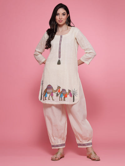 Off-white embroidered shirt with Afghani salwar set featuring detailed kurti and elastic waistband.