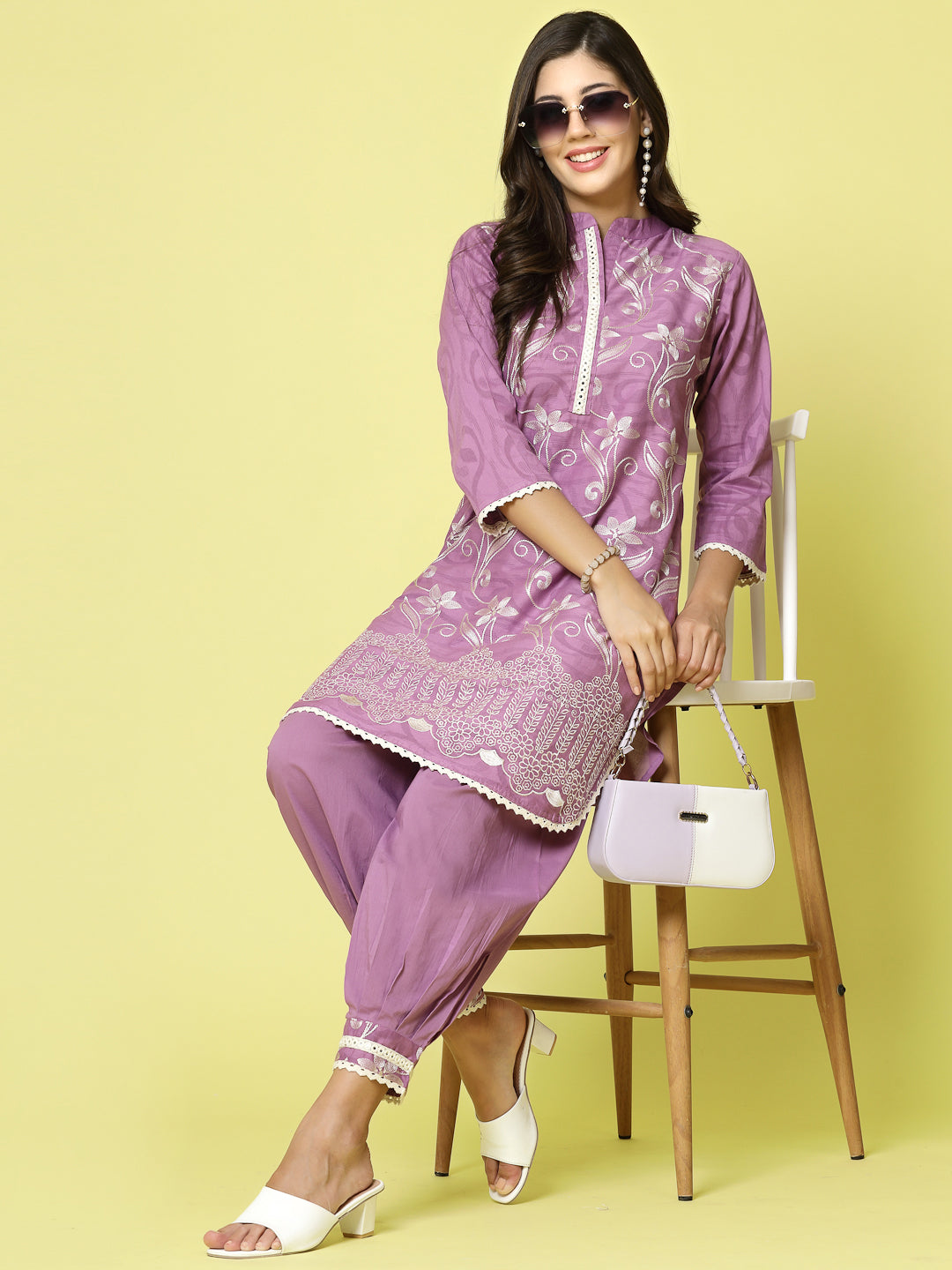 Women Embroidered Kurta with Afghani Pants Co-ords Set featuring three-quarter sleeves and Mandarin collar.