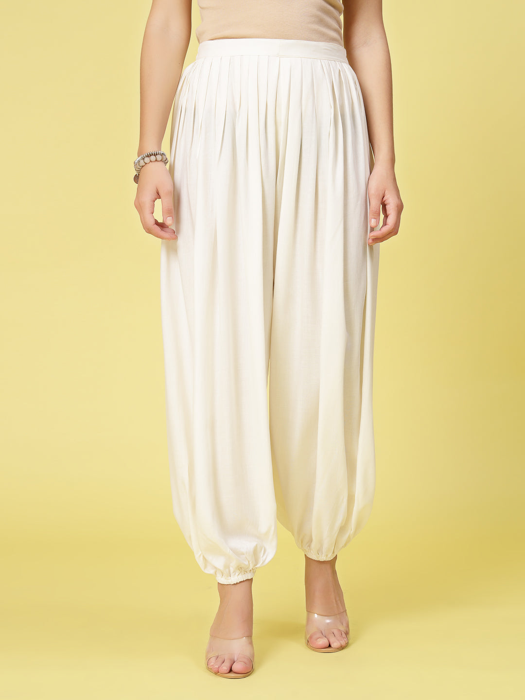 Women solid rayon loose fit salwar with elasticated waistband and hem.