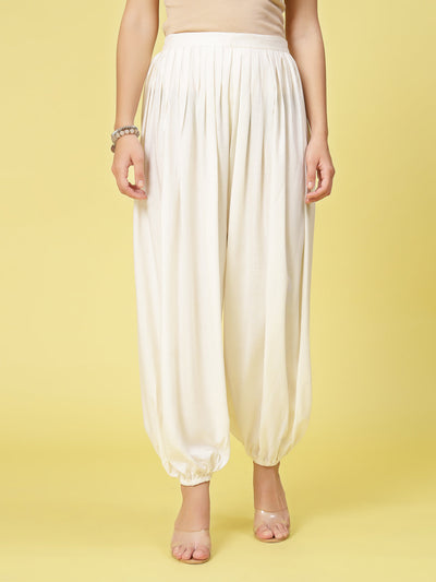 Women solid rayon loose fit salwar with elasticated waistband and hem.