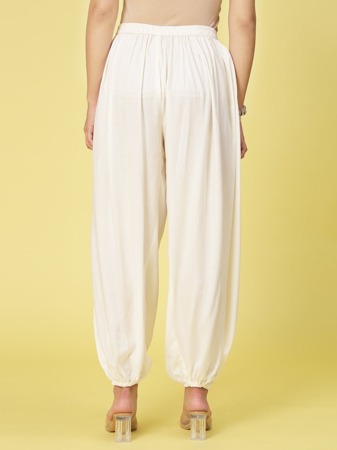 Women solid rayon loose fit salwar with elastic waistband and hem.