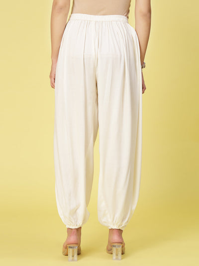 Women solid rayon loose fit salwar with elastic waistband and hem.
