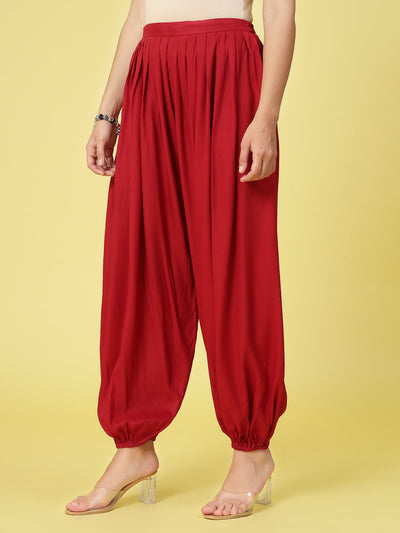 Women solid rayon loose fit salwar with elasticated waistband and hem.
