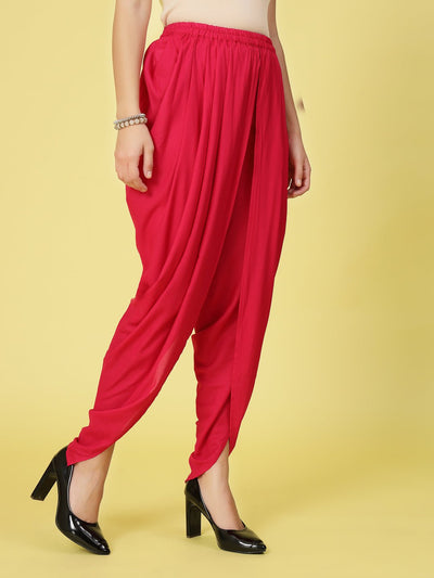Women solid rayon dhoti salwar with gathered pleats and elastic waistband.
