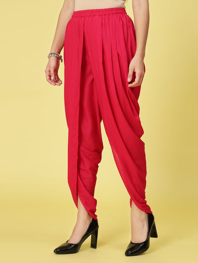 Women solid rayon dhoti salwar with pleated detail and elastic waistband.