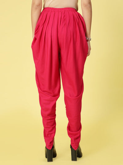 Women solid rayon dhoti salwar with pleated detail and elastic waistband.