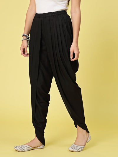 Women’s solid rayon dhoti salwar with pleated details and elastic waistband.