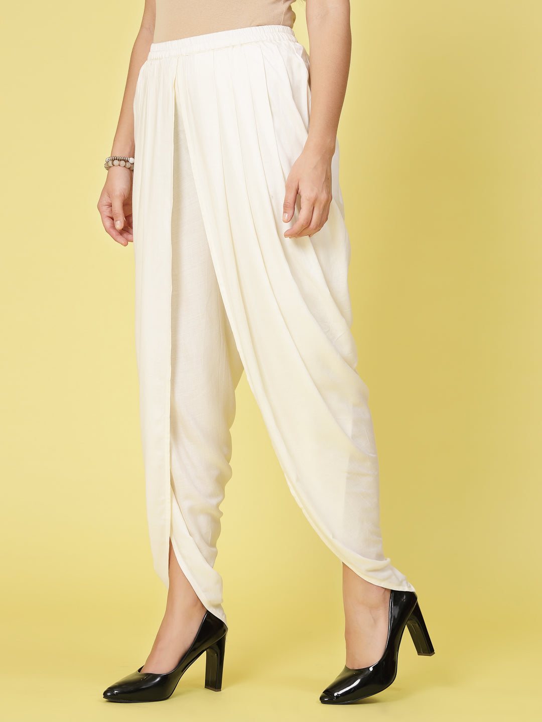 Women Solid Rayon Dhoti Salwar with pleated detail and elastic waistband.