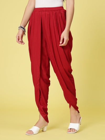 Women solid rayon dhoti salwar with pleated detail and elastic waistband.