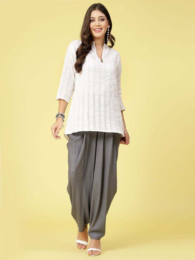 Women wearing gray solid rayon dhoti salwar with elasticated waistband.