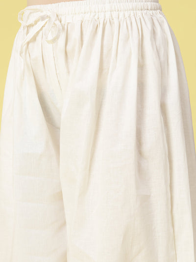 Off-White Solid Cotton Afghani Salwar with elasticated waistband and drawstring.