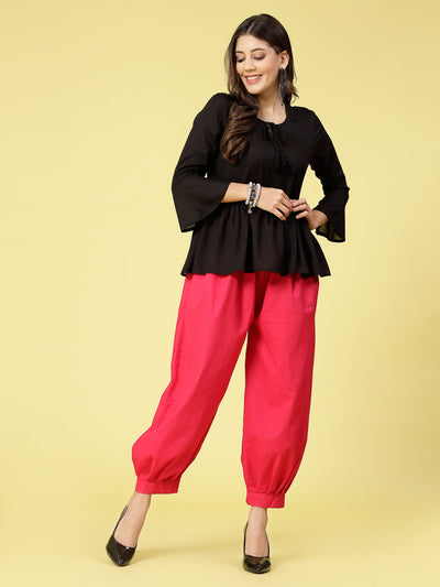 Magenta solid cotton Afghani salwar with elasticated waistband and drawstring.