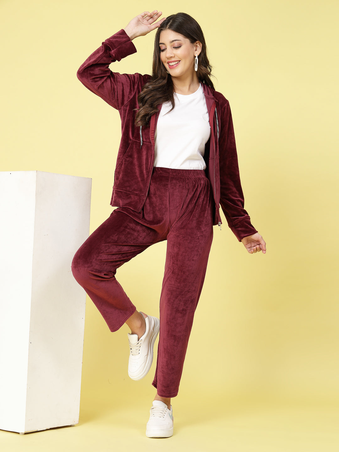 Women solid hooded velvet co-ord set with zip closure and elasticated waistband.