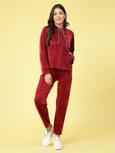 Women solid hooded velvet co-ord set with long sleeves and elastic waistband.