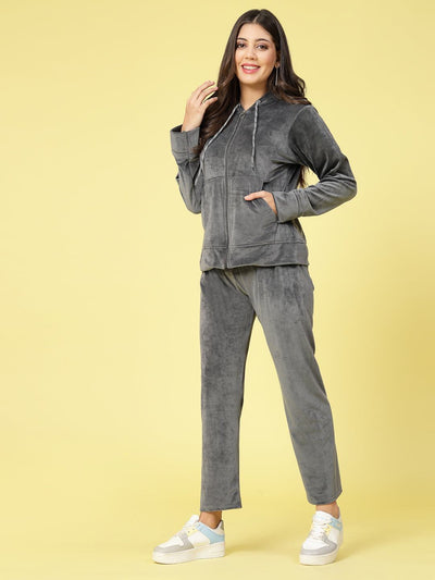 Women solid hooded velvet co-ord set with long sleeves and zip closure.