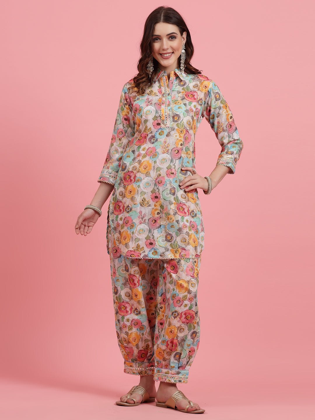 Women printed cotton co-ords with tunic and Afghani trousers, featuring a shirt collar and three-quarter sleeves.