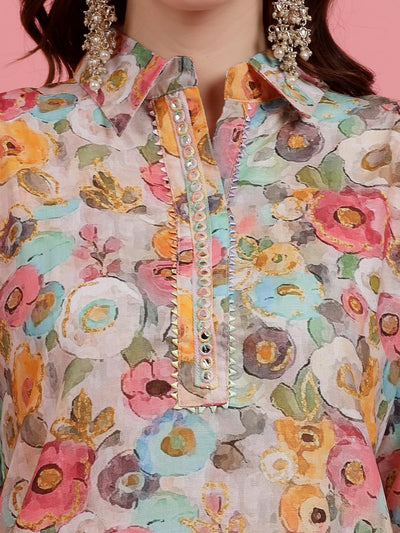 Women printed cotton co-ords with floral embroidered tunic and Afghani trousers.