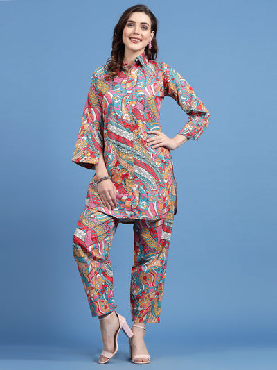 Women printed cotton co-ords with tunic and afghani trousers, featuring vibrant patterns and a shirt collar.