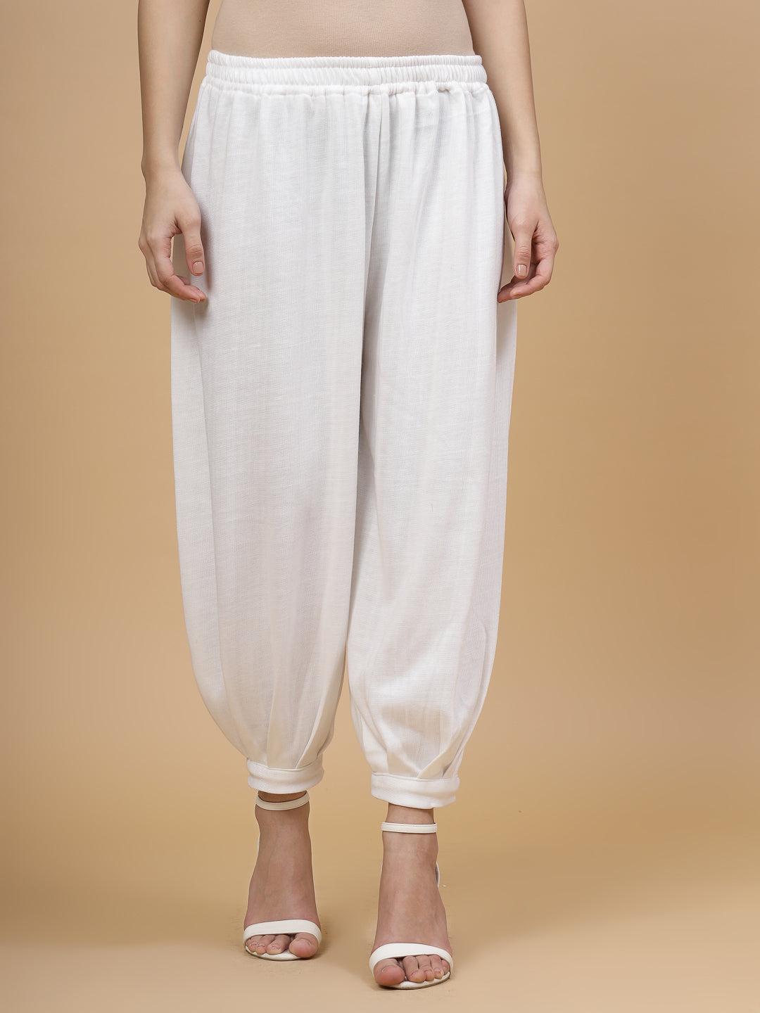 White solid woollen Afghani salwar with elasticated waistband.