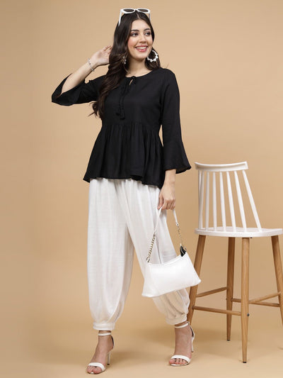 White solid woollen Afghani salwar with elasticated waistband.