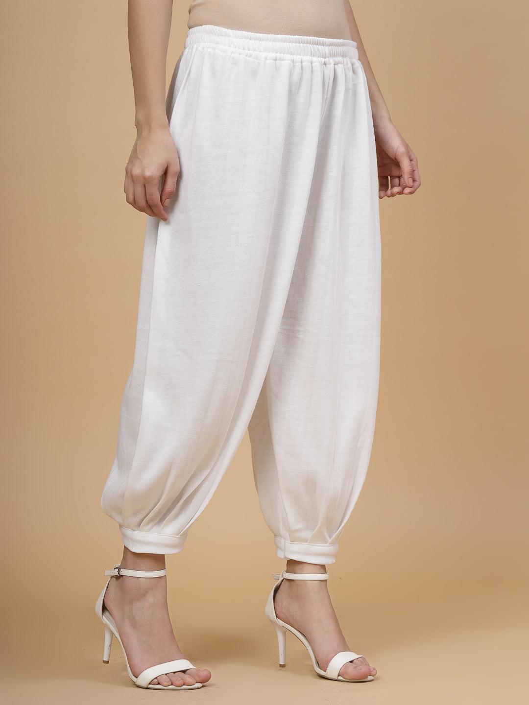 White solid woollen Afghani salwar with elasticated waistband.