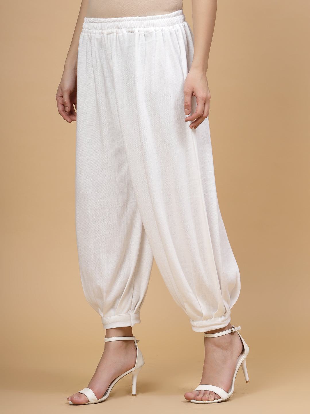 White solid woollen Afghani salwar with elasticated waistband.