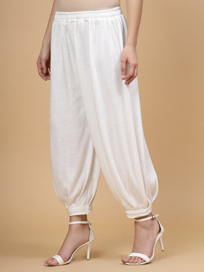 White solid woollen Afghani salwar with elasticated waistband.