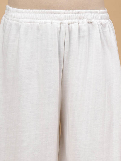 White Solid Woollen Afghani Salwar with elastic waistband.
