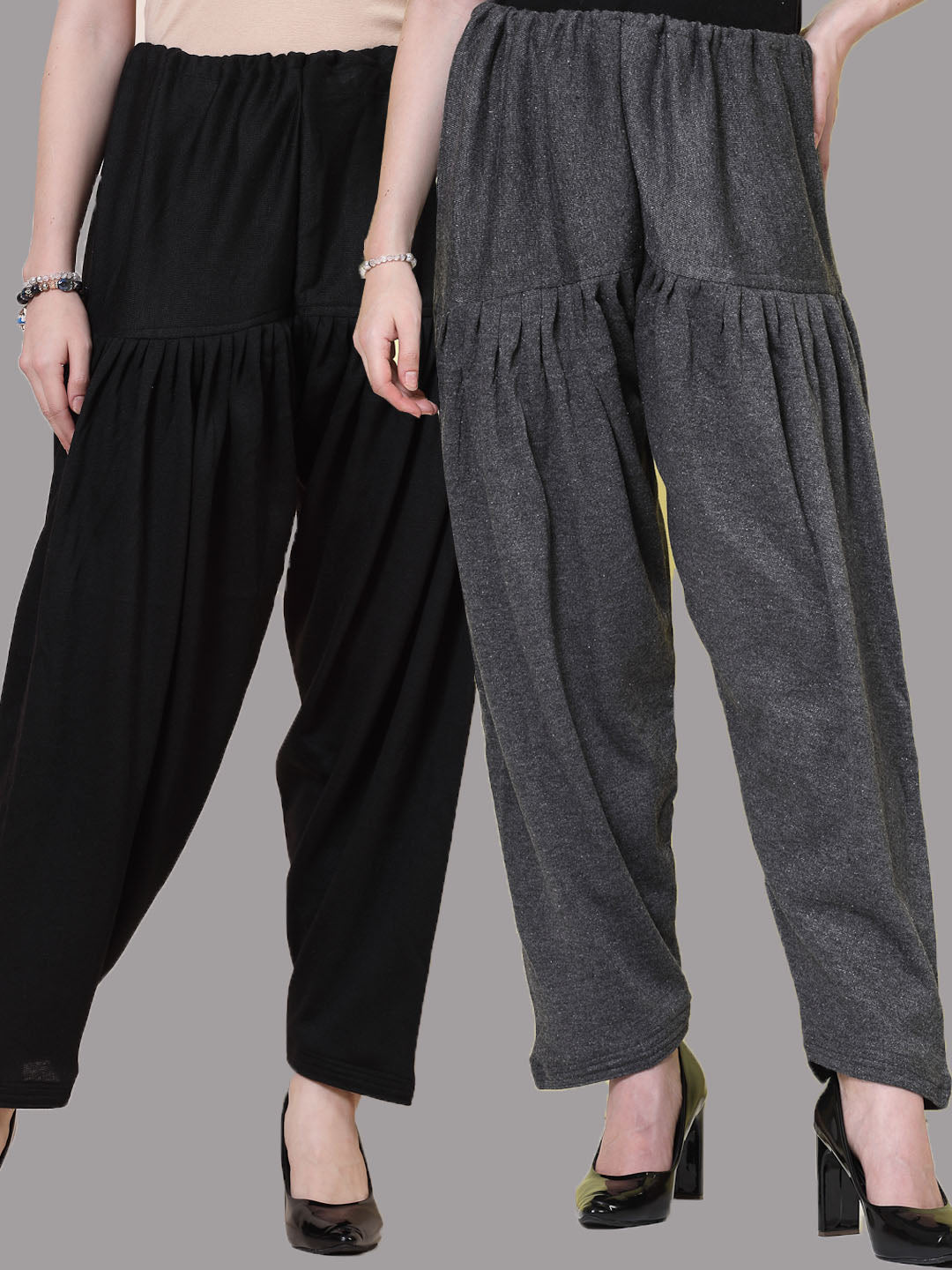Black and grey woollen salwar pack of two with loose fit and drawstring closure.