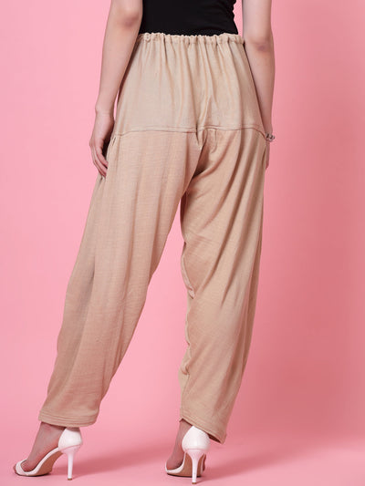 Magenta & Fawn Solid Woollen Salwar with loose-fit and drawstring closure.
