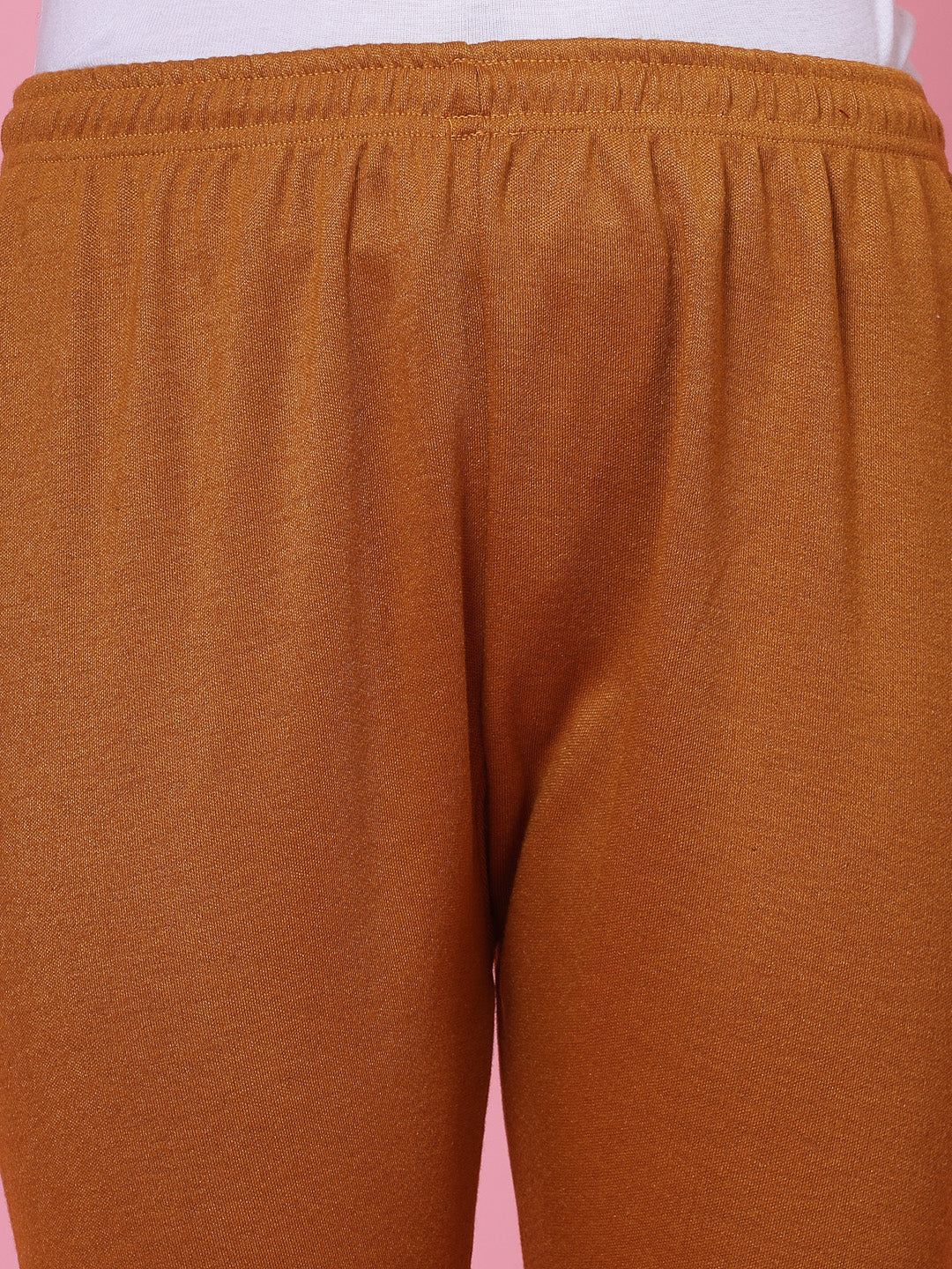 Mustard woollen leggings with elasticated waistband and drawstring.