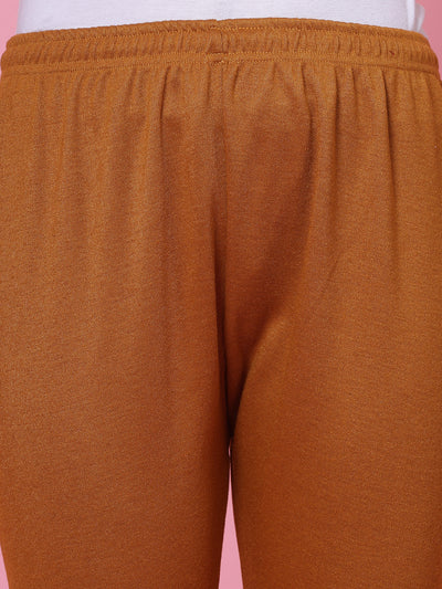 Mustard woollen leggings with elasticated waistband and drawstring.