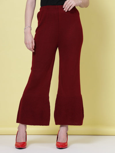 White & maroon solid woollen palazzo with elastic waistband.