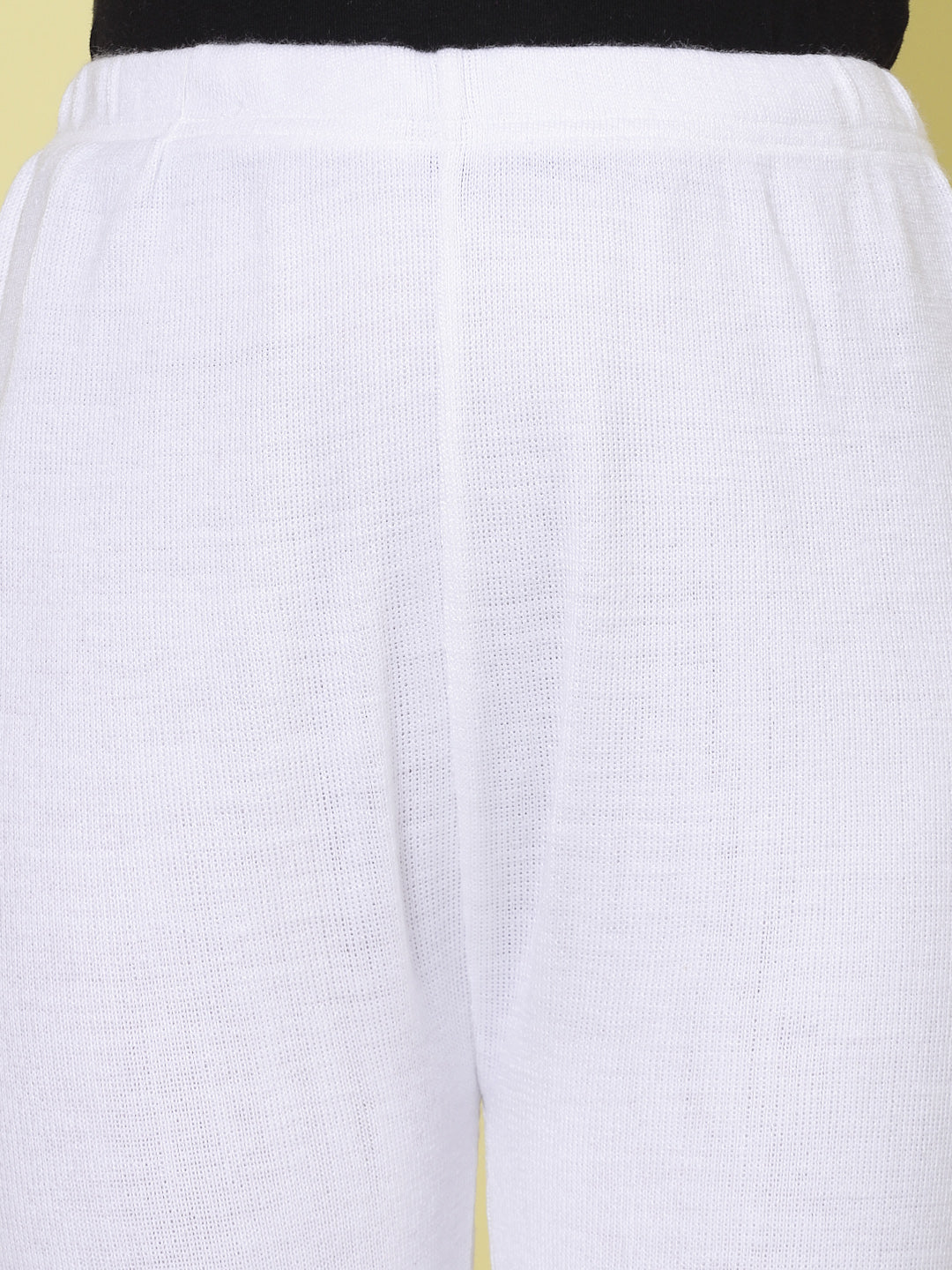 White woollen palazzo with elasticated waistband and slip-on closure.