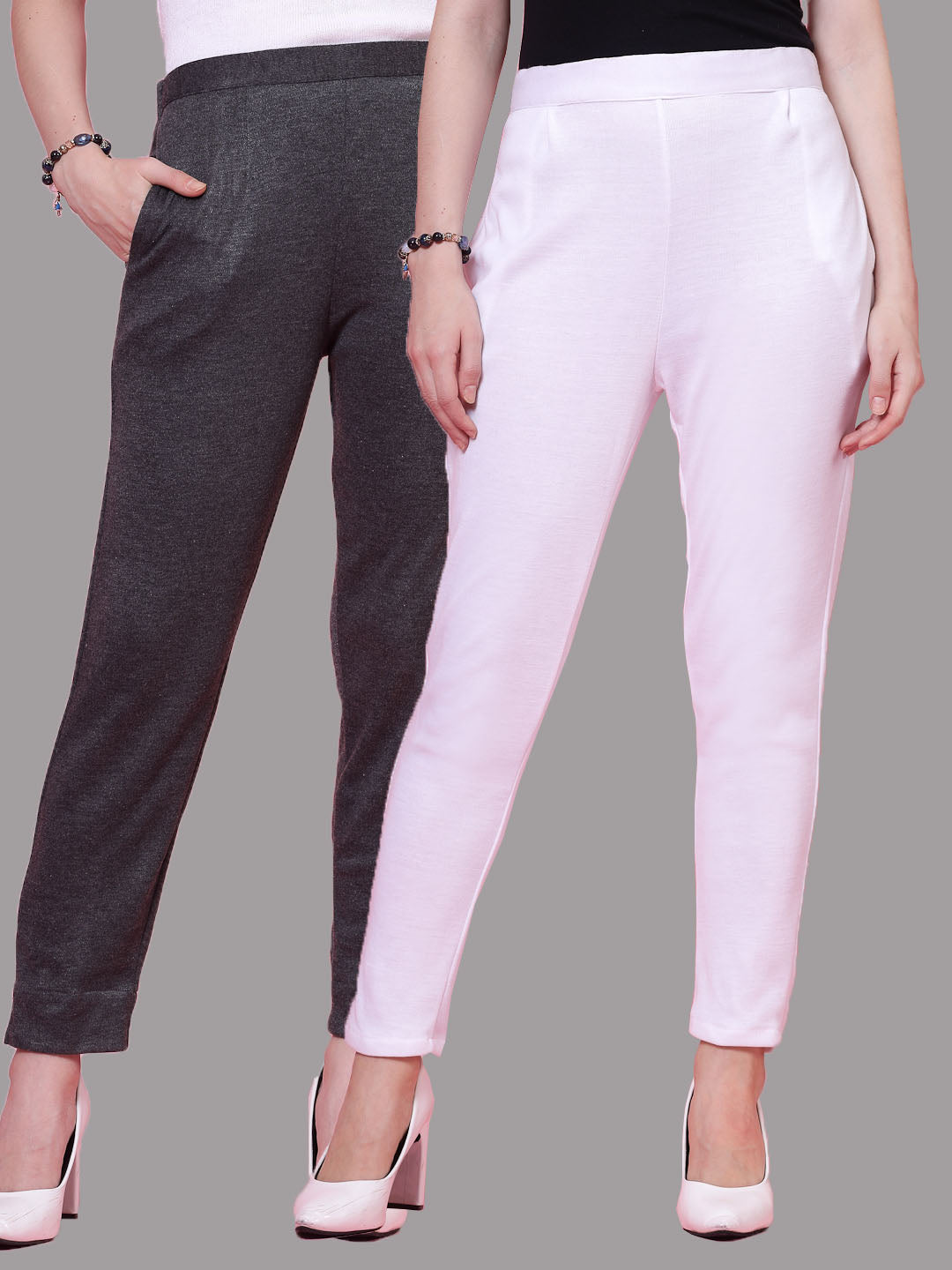 Dark grey and white solid woollen trousers with elasticated waistband and side pockets.
