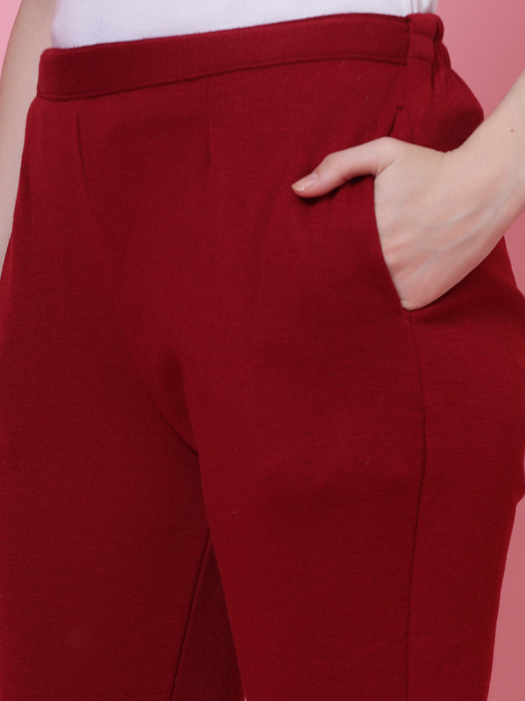 White and maroon solid woollen trouser pack with elastic waistband and side pockets.