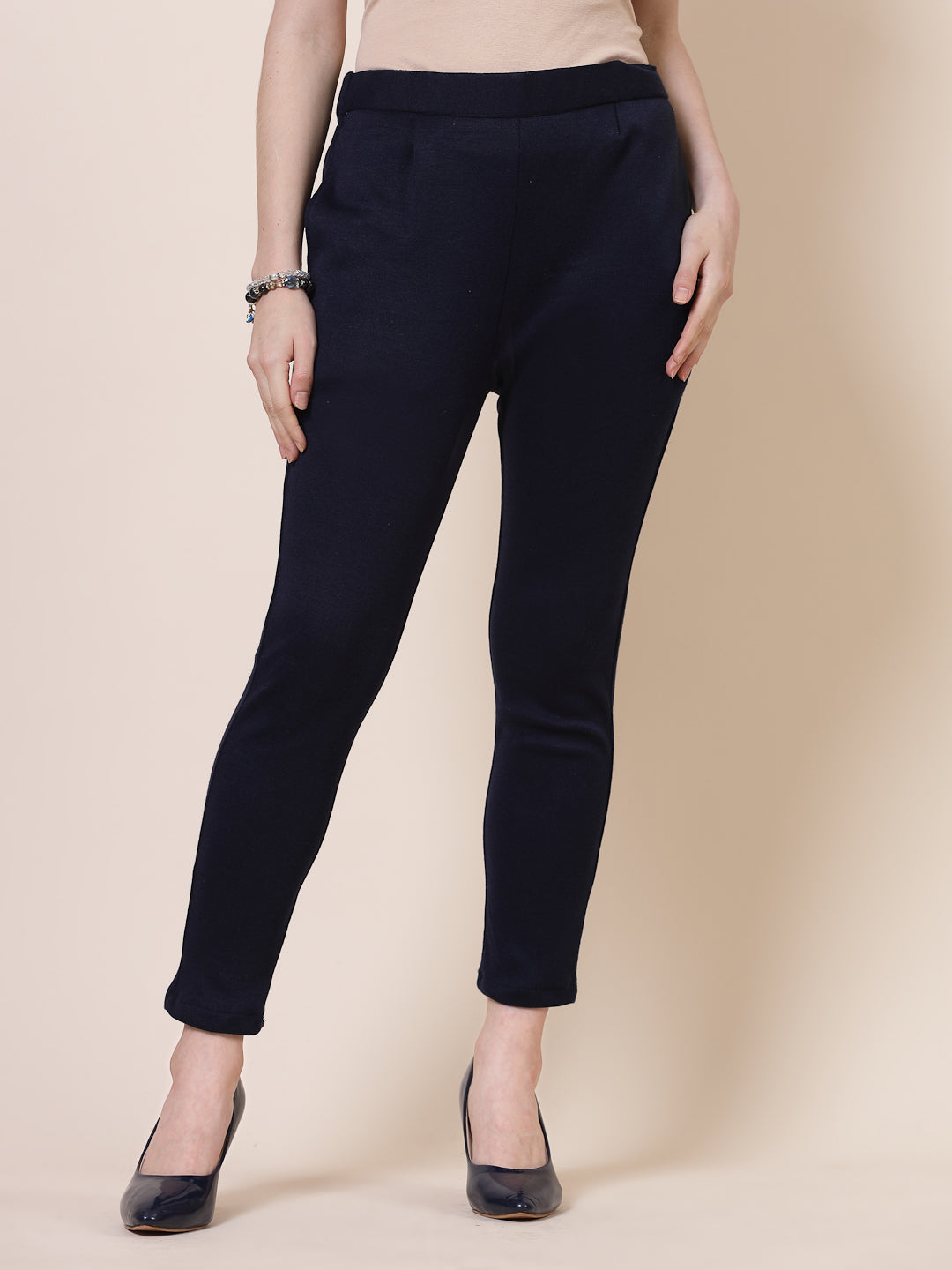White & Navy Blue solid woollen trouser with elasticated waistband and side pockets.