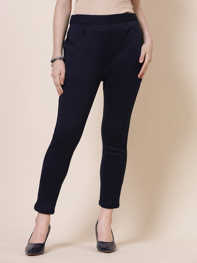 White & Navy Blue solid woollen trouser with elasticated waistband and side pockets.