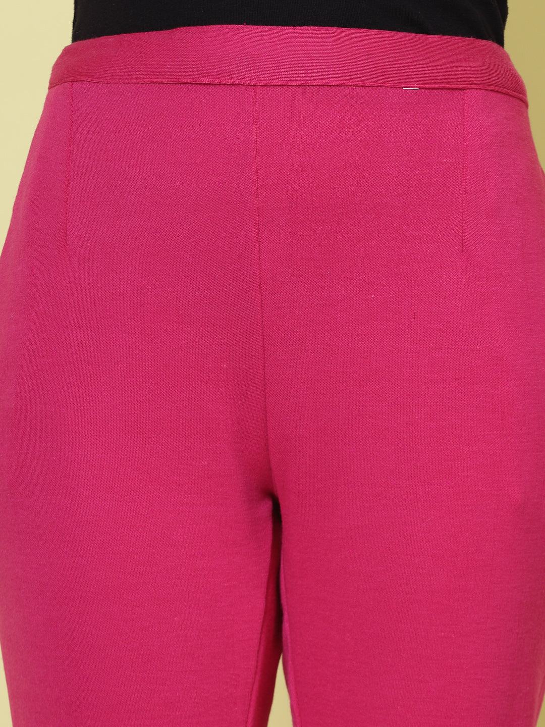 Magenta woollen trouser with elastic waistband and side pockets.