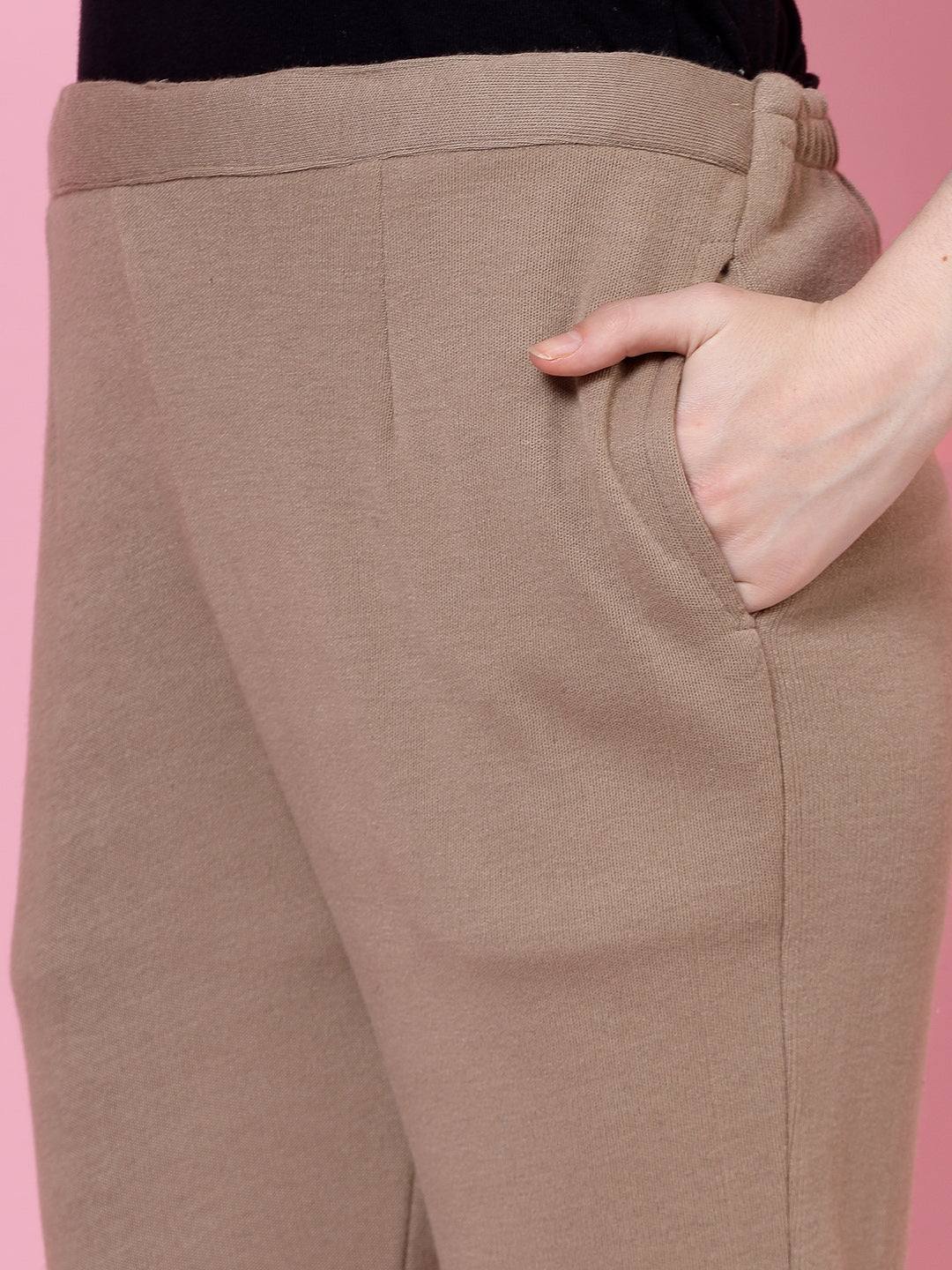 Dark Fawn woollen trouser with elasticated waistband and side pocket.