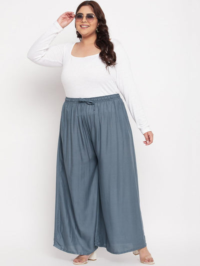 Grey solid rayon jumbo sharara with elasticated waistband and drawstring.