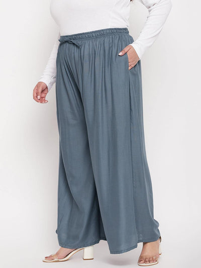 Grey solid rayon jumbo sharara with elasticated waistband and drawstring.
